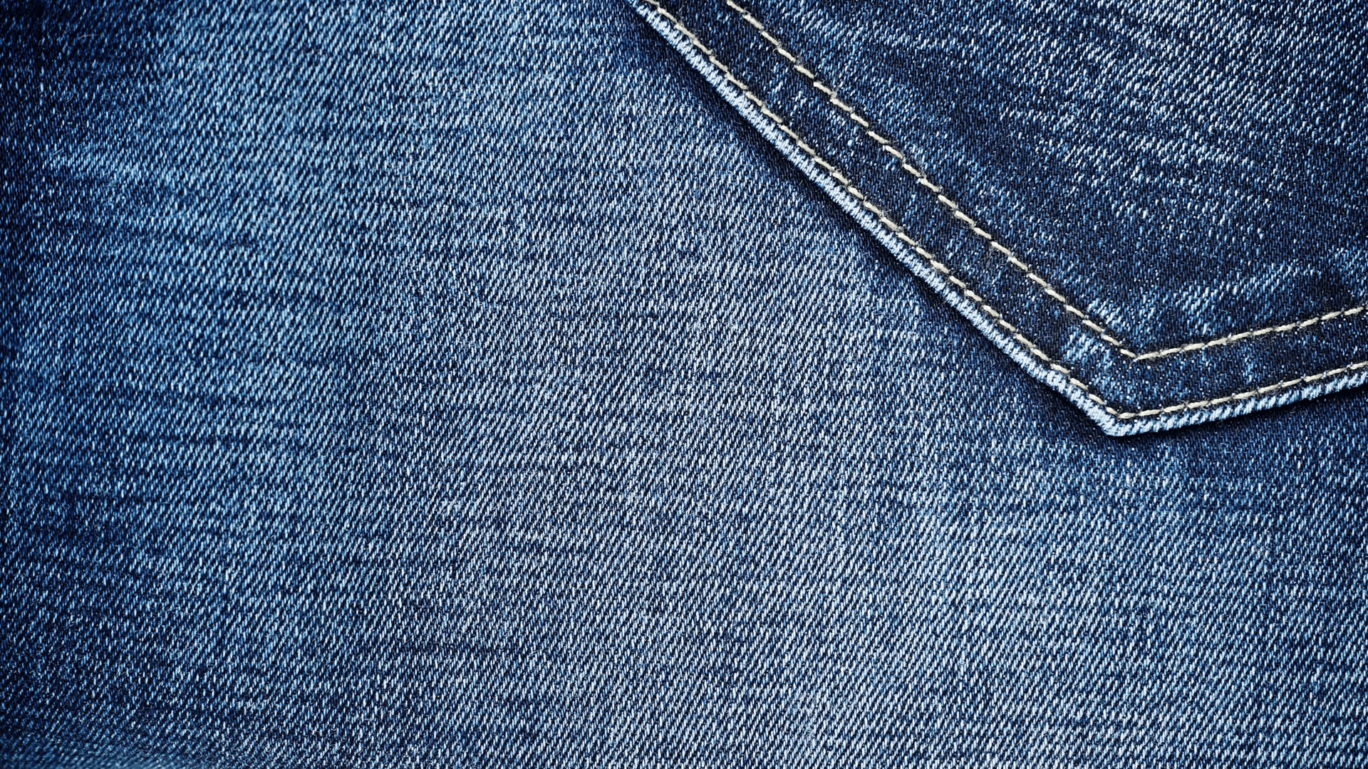 Четверо джинсов. Джинсовая ткань. Текстура джинсовой ткани. Джинсы ткань. Джинса фон.