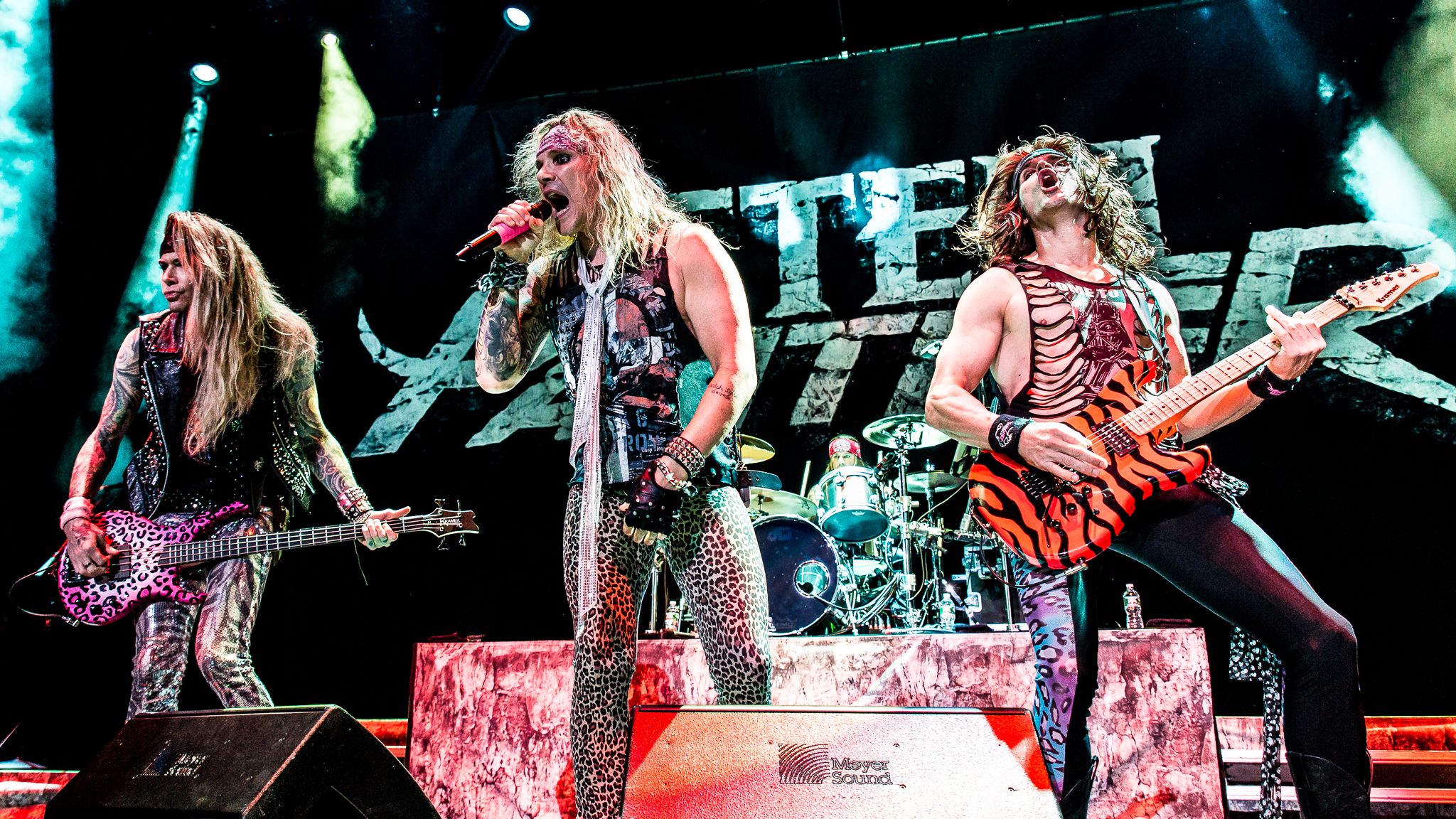 Песня что за уроды на сцене. Группа Steel Panther. Трэвис Хейли Steel Panther. Steel Panther группа фото. Steel Panther клип.