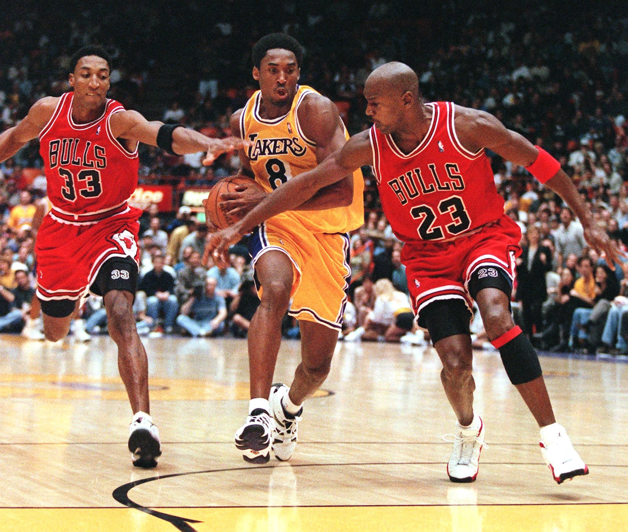 Download Kobe Bryant competing with Michael Jordan Wallpaper  Wallpapers com