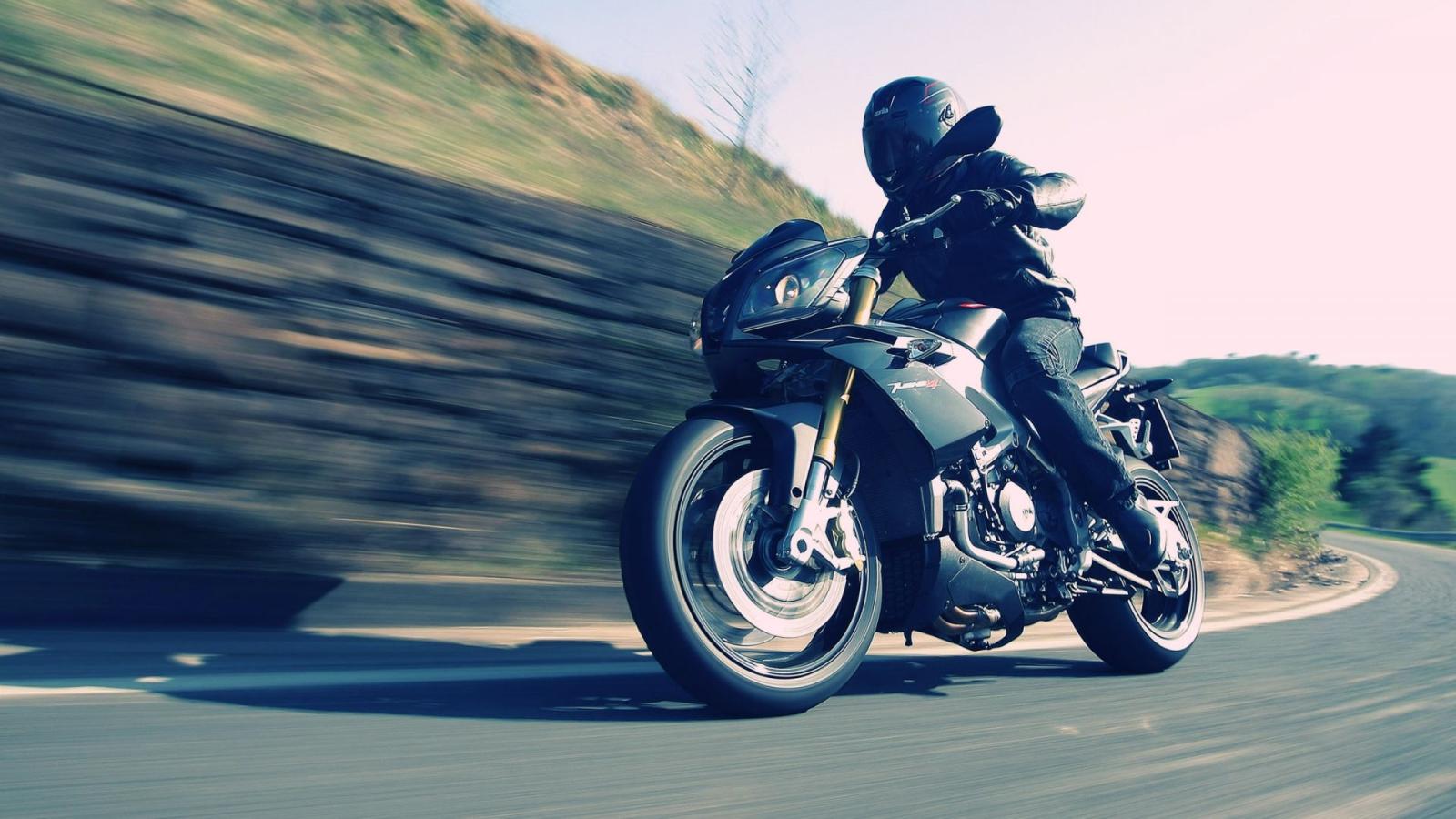 1920x1080 Aprilia Rider Motorcycle Wallpaper Wallpaper | WallpaperLepi