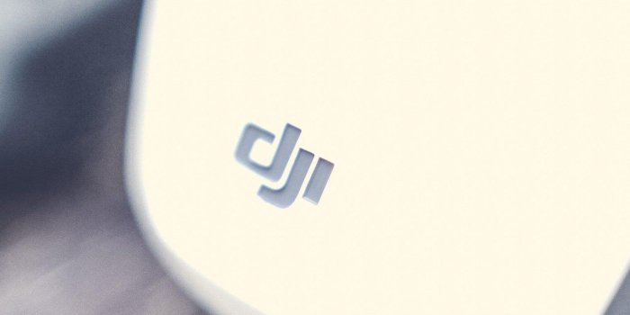 1280x2120 Download Blur Drone DJI Logo for iPhone 6 Plus Wallpaper : Brands