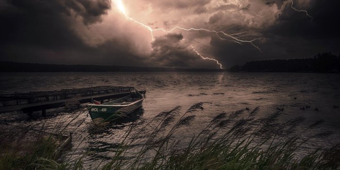1920x1200 Wallpaper Night, lake, boat, lightning, storm 1920x1200 HD Picture