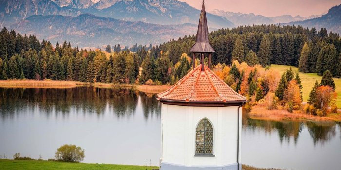 1332x850 Wallpaper autumn, forest, mountains, shore, the building, cross
