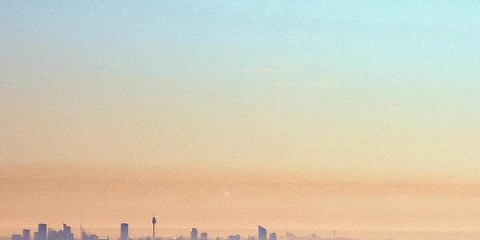 750x1334 Clear Blue Sky Morning Mist Over City Metropolis iPhone 6 Wallpaper