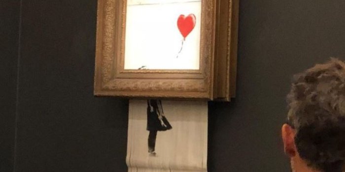 2048x1152 Banksy painting Girl With Red Balloon 'self-destructs' after £1m