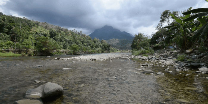 1920x1080 Beautiful shallow river with mountain background on cloudy day. Idyllic  Nature Holiday Scene. Stock Video Footage - Storyblocks Video