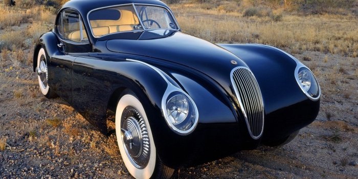 1366x768 Download wallpaper 1366x768 jaguar, classic, retro, auto tablet