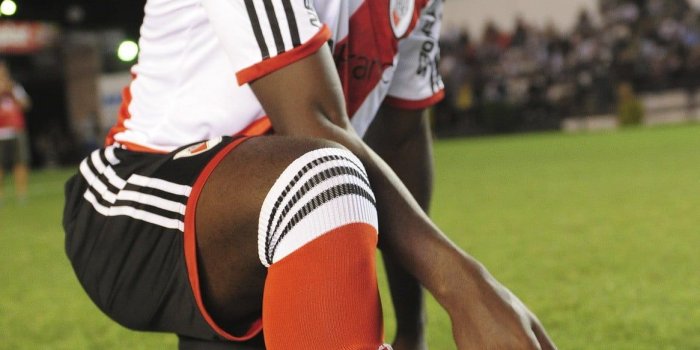 1165x1920 Pair of red adidas soccer cleats, River Plate, Argentina, Colombia