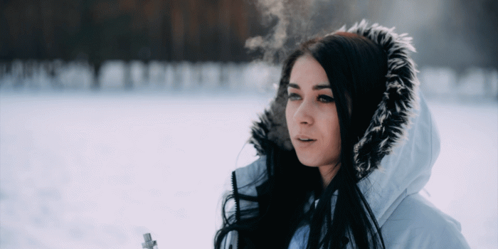 1920x1080 Pretty young girl vaping outside in good sunny winter weather. Stock Video  Footage - Storyblocks Video