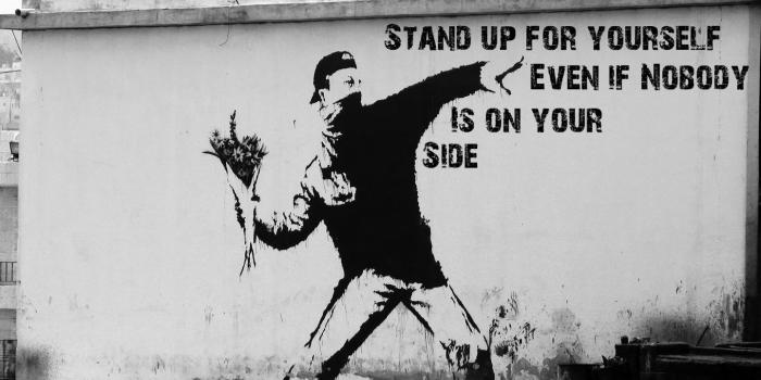 1440x900 Paper Dump: Banksy Anarchist Wallpaper