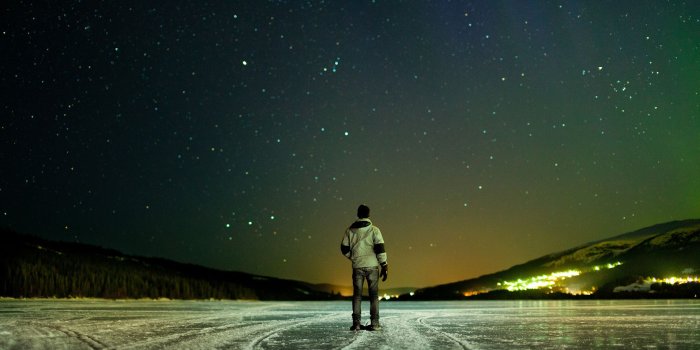 2048x1365 night-winter-sky-stars-river-ice-the-horizon-the-lights-man.-mood