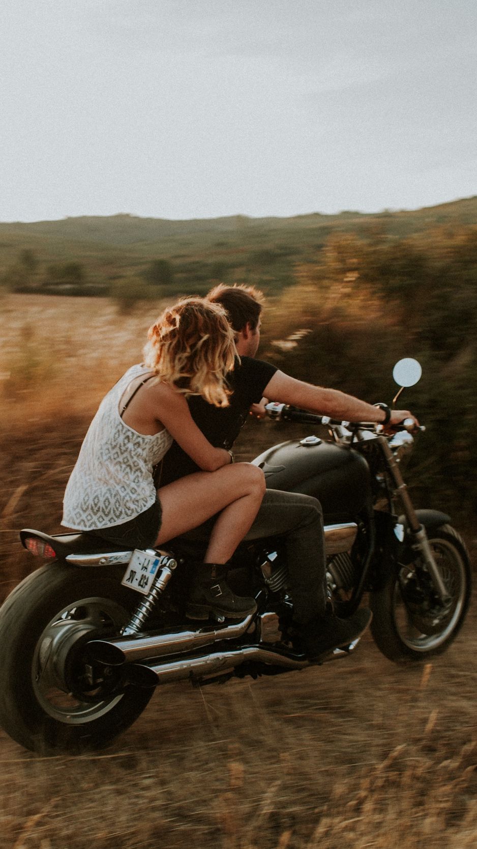 938x1668 Download wallpaper 938x1668 couple, motorcycle, love, speed iphone 8