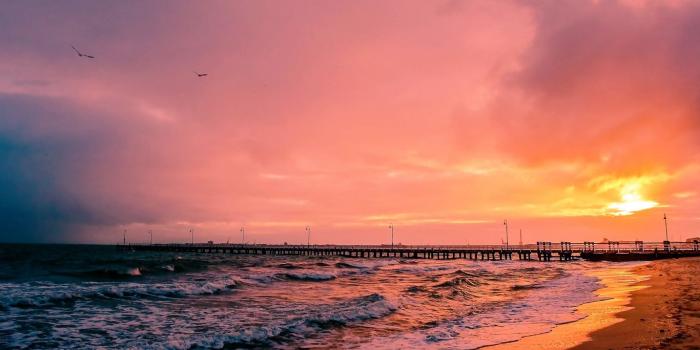 1366x768 Download wallpaper 1366x768 sunset, sea, sun, landscape tablet