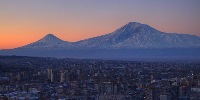 1366x768 Download wallpaper 1366x768 armenia, yerevan, city, mountain