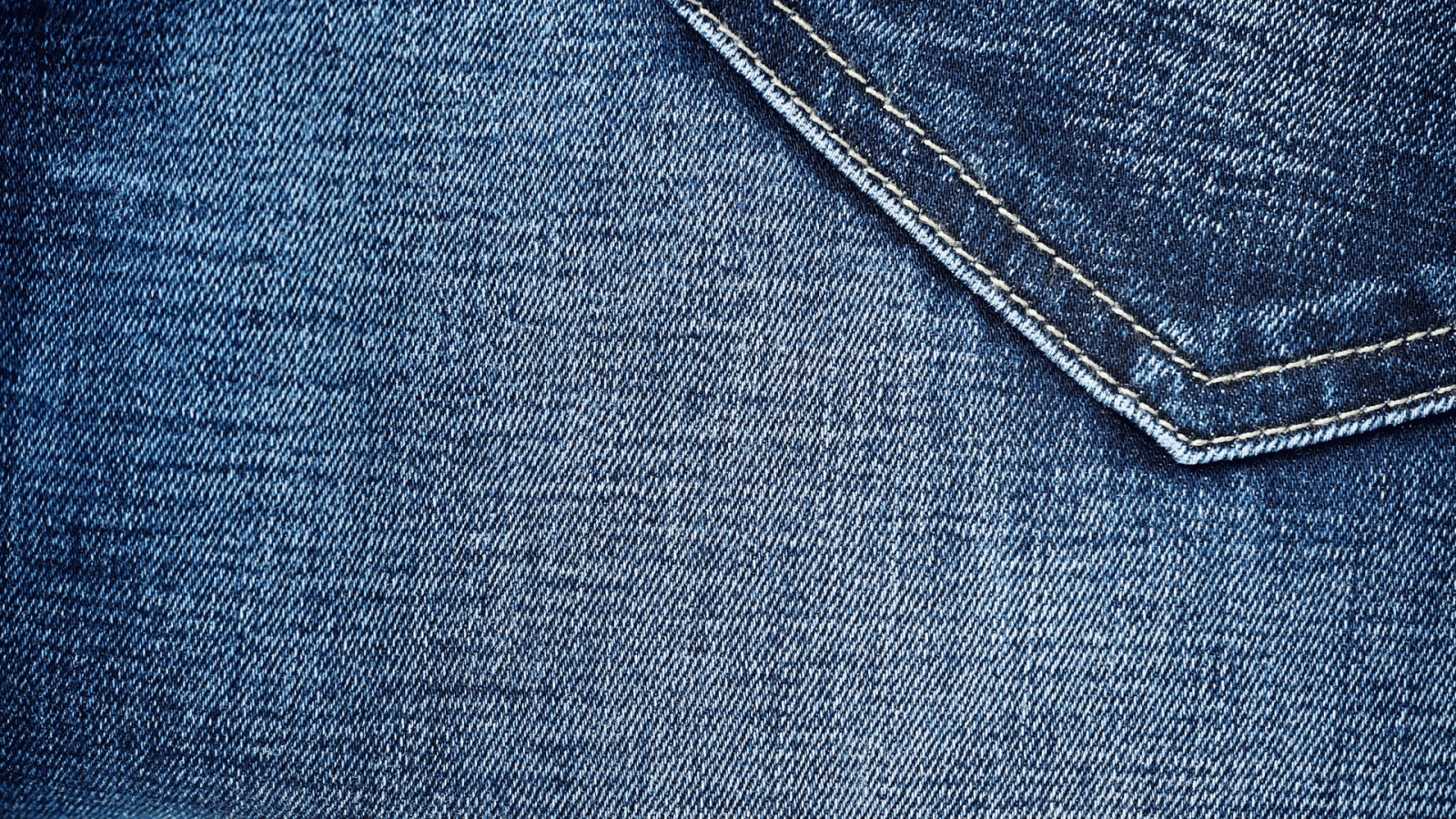 1920x1080 Closeup detail of blue denim jeans, back pocket, texture background. Rack  focus 4K ProRes HQ codec Stock Video Footage - Storyblocks Video