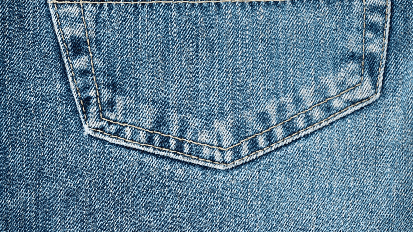 1920x1080 Closeup detail of blue denim jeans back pocket, texture background. Dolly  sliding shot 4K ProRes HQ codec Stock Video Footage - Storyblocks Video