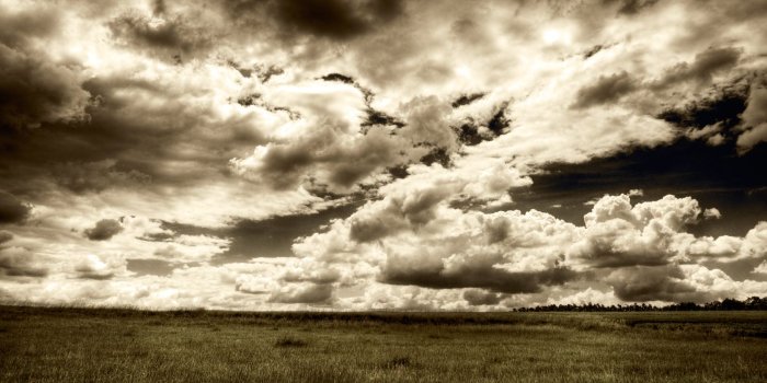 1680x1050 Dramatic Sky over Field widescreen wallpaper