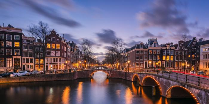 1920x1200 Download wallpapers Amsterdam, evening, city lights, canal, bridge