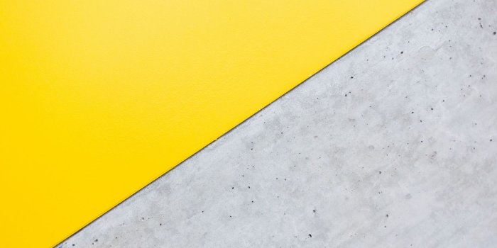 1366x768 Download wallpaper 1366x768 angle, triangle, yellow, gray