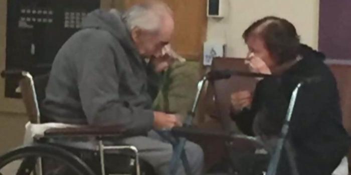 1600x900 Photo of couple saying goodbye is breaking hearts