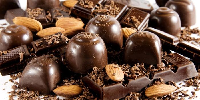 1332x850 Wallpaper black, dark, chocolate, candy, nuts, almonds, sweet