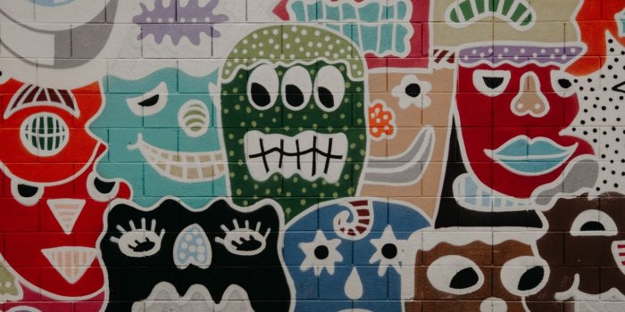 1366x768 Download wallpaper 1366x768 art, graffiti, wall, faces tablet