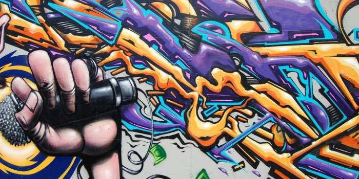 1366x768 Download wallpaper 1366x768 graffiti, street art, hand, microphone