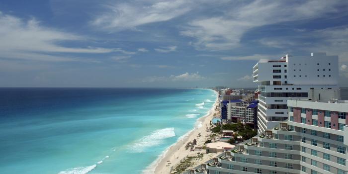 2560x1440 Image Mexico Cancun Sea Sky Waves Coast Horizon Cities 2560x1440