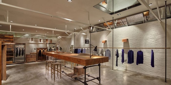 1134x756 boutique store interior exposed brick wall concept | Boutique design