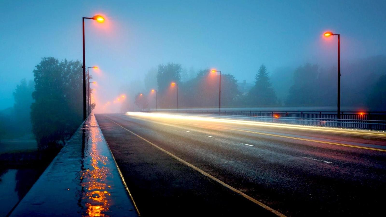 1920x1080 A Highway Bridge In A Foggy Rainy Night HD Desktop Background