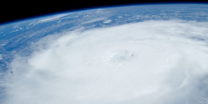 1350x2400 Download wallpaper 1350x2400 hurricane, iss, earth, clouds, element