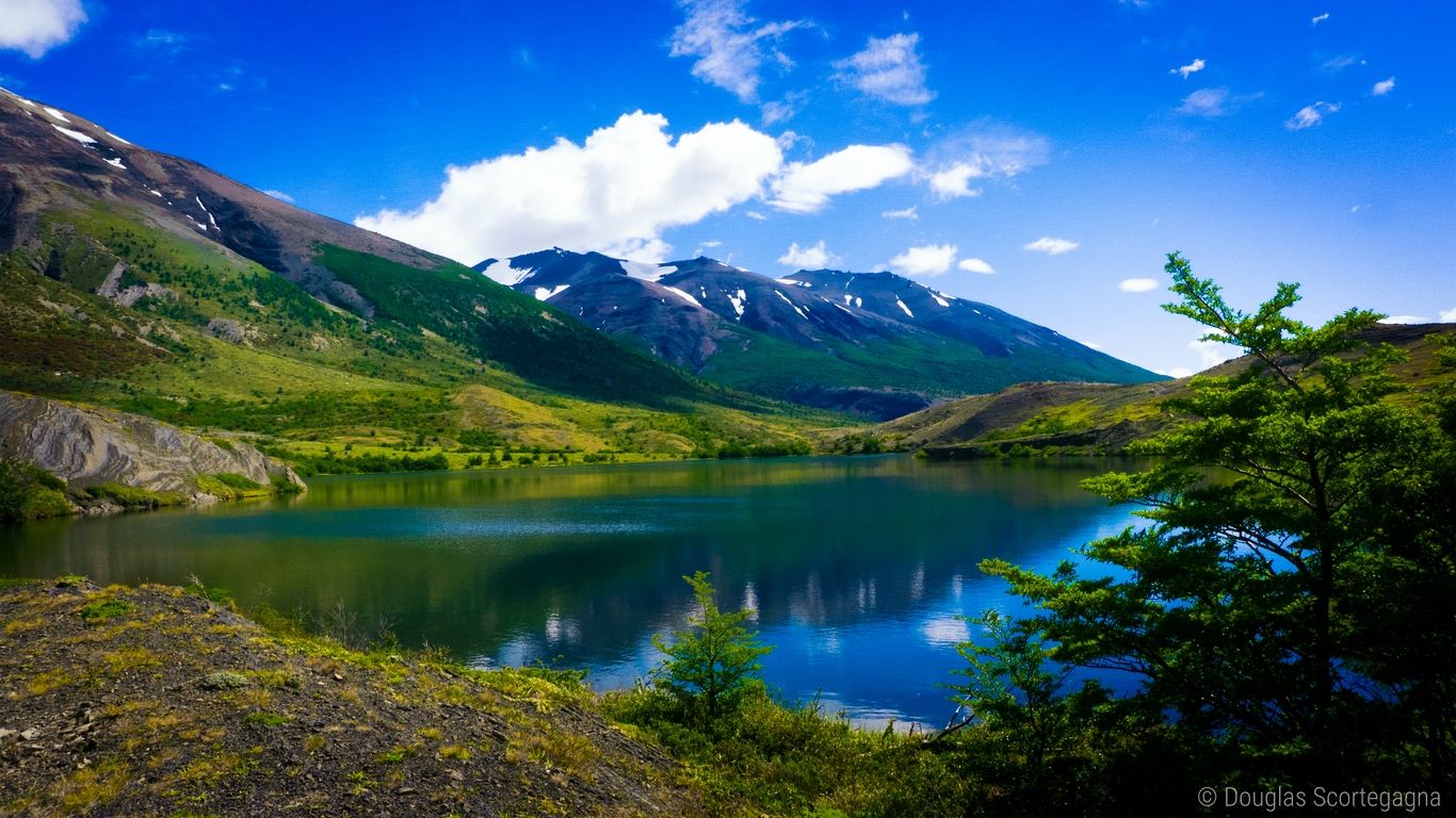 1366x768 Download wallpaper 1366x768 mountains, lake, grass, sky, summer