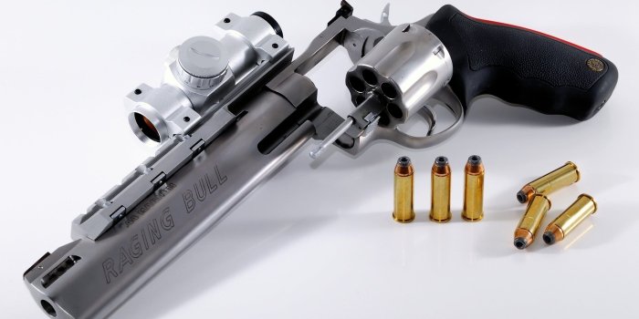 2560x1600 Silver and black Raging Bull revolver gun and gold bullets HD