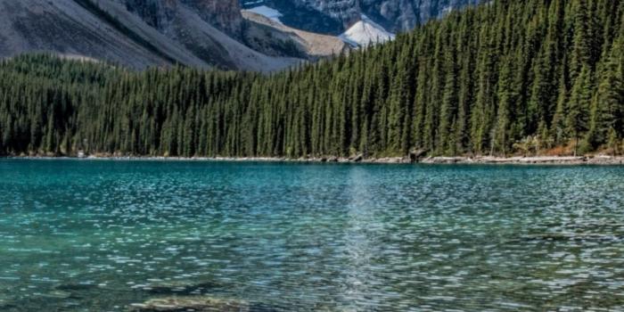 1125x2436 Download 1125x2436 wallpaper clean lake, mountains range, trees