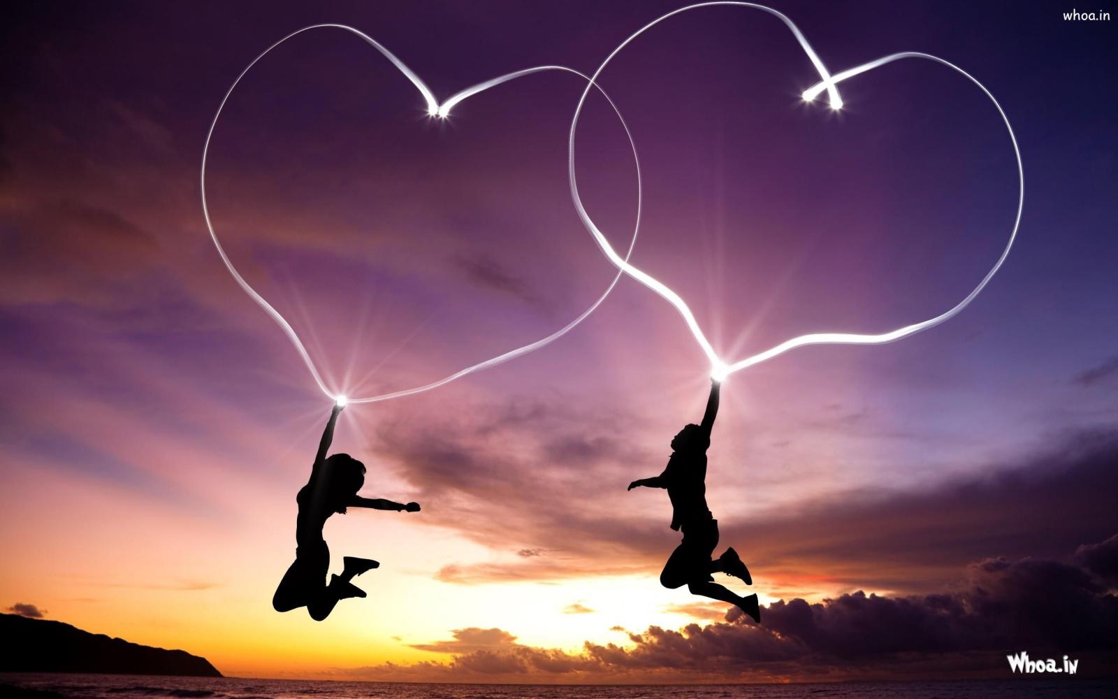 2560x1600 Girl And Boy Jump With Love Heart HD Love Wallpaper