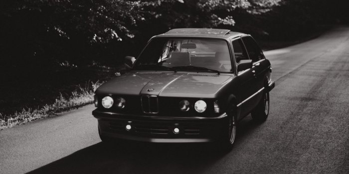 1366x768 Download wallpaper 1366x768 bmw, car, bw, road tablet, laptop hd