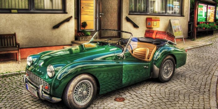1920x1080 Green Triumph Spitfire on the street wallpaper - Car wallpapers - #46167