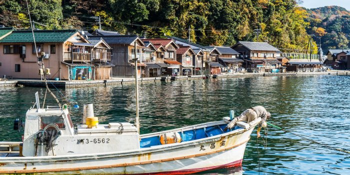 2560x1600 Download wallpapers fishing boat, Japanese city, mountain landscape