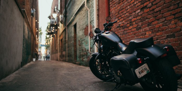 3840x2160 Wallpaper Harley Davidson black motorcycle back view, path 3840x2160