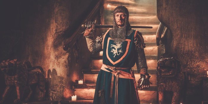 1920x1080 3-18-CH Medieval king on stairs holding sword | BrothersOfTheBook.com