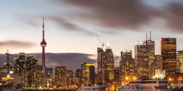 3840x2564 a sunset skyline over the toronto harbour cityscape with two ships