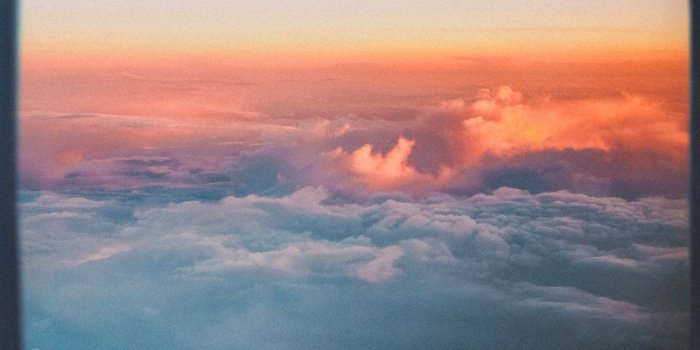 1125x2436 Take me to the sky #sunset #lost #cloud #plane #moment #Wallpaper