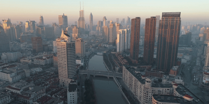 1920x1080 Shanghai Skyline in the Sunny Morning. Puxi District. China. Aerial View.  Drone is Flying Forward and Upward. Establishing Shot Stock Video Footage - 