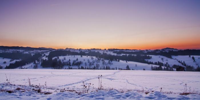 1600x900 Download wallpaper 1600x900 field, snow, winter, sunset widescreen
