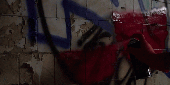 1920x1080 A boy drawing a graffiti with a red spray paint. Stock Video Footage -  Storyblocks Video