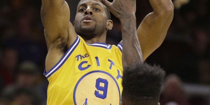 960x1320 Andre Iguodala takes a shot against Iman Shumpert from the Cleveland