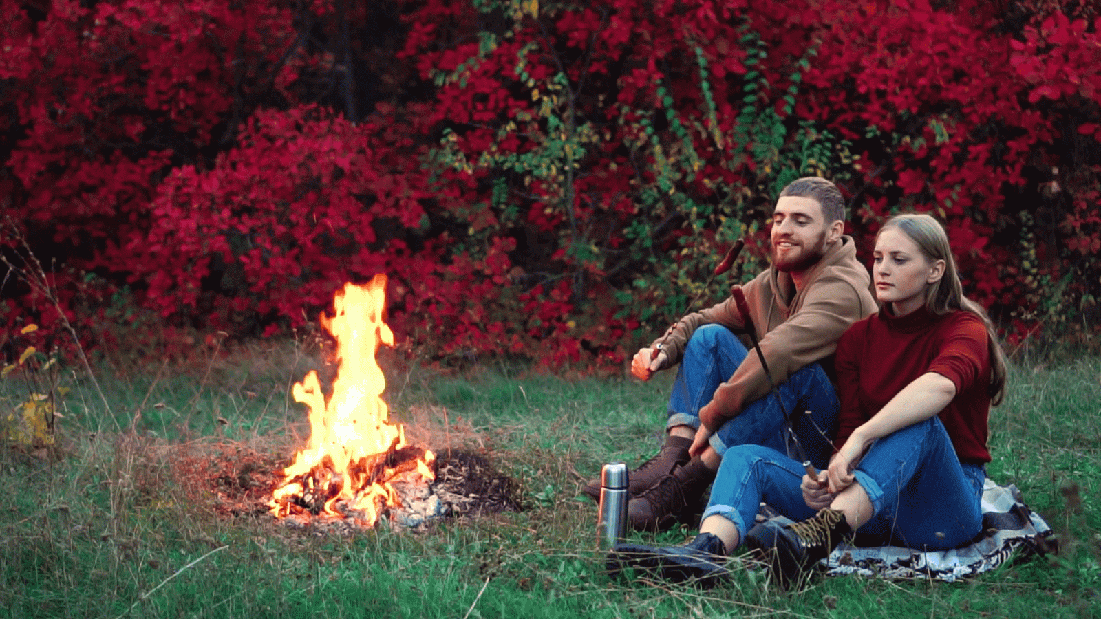 1920x1080 Lovely romantic couple enjoy having outside picnic barbecue lunch by  campfire flame in colorful autumn forest in slowmo Stock Video Footage -