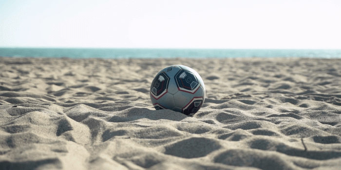 1920x1080 Kicking a soccer on beach sand. Stock Video Footage - Storyblocks Video