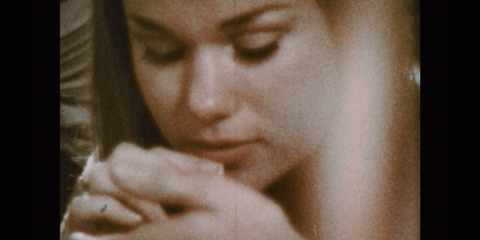 1920x1080 1970s: UNITED STATES: girl smokes dope. Students relax in house together.  Man puffs on cigarette. Stock Video Footage - Storyblocks Video