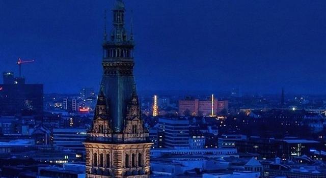 640x1385 Blue night winter city iPhone X Free Download
